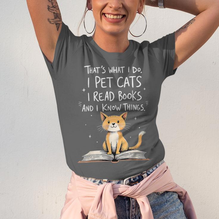 That's What I Do I Pet Cats I Read Books And I Know Things Unisex Jersey T-Shirt That's What I Do I Pet Cats I Read Books And I Know Things Unisex Jersey T-Shirt
