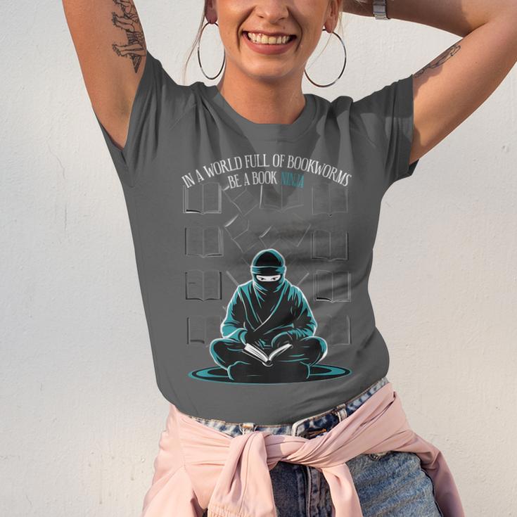 In A World Full Of Bookworms Be A Book Ninja Reading Reader Unisex Jersey T-Shirt In A World Full Of Bookworms Be A Book Ninja Reading Reader Unisex Jersey T-Shirt