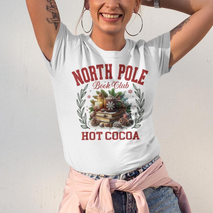 North Pole Book Club Hot Cocoa Bookworm Christmas Xmas Unisex Jersey T-Shirt North Pole Book Club Hot Cocoa Bookworm Christmas Xmas Unisex Jersey T-Shirt