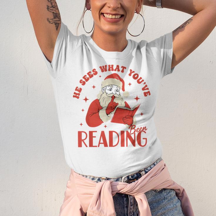 He Sees What You'Ve Been Reading Santa Book Unisex Jersey T-Shirt He Sees What You'Ve Been Reading Santa Book Unisex Jersey T-Shirt