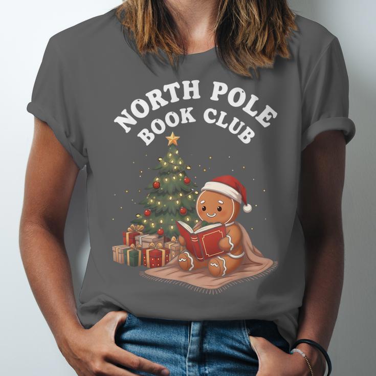 North Pole Book Club Gingerbread Christmas Reading Unisex Jersey T-Shirt North Pole Book Club Gingerbread Christmas Reading Unisex Jersey T-Shirt