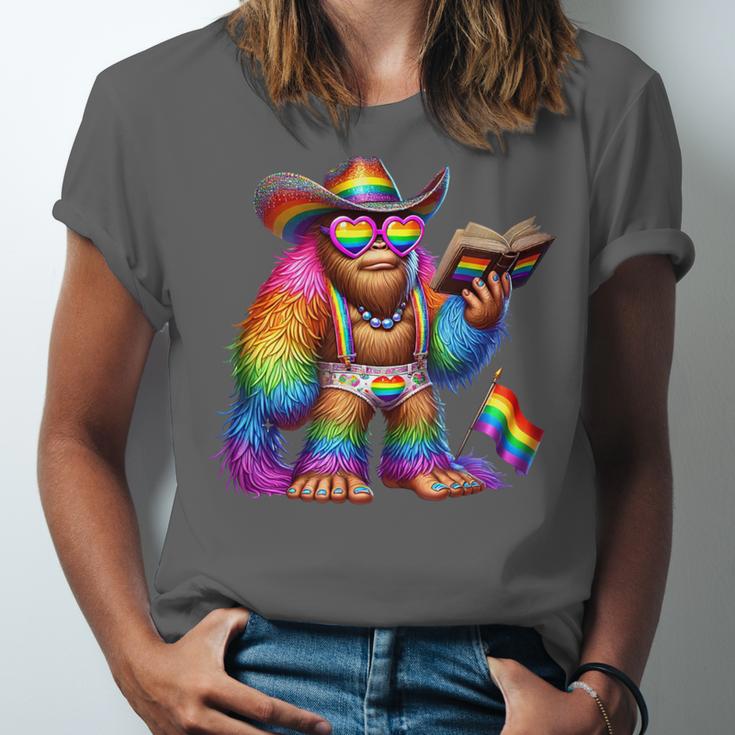 Rainbow Pride Bigfoot Reading Book With Heart Glasses Unisex Jersey T-Shirt Rainbow Pride Bigfoot Reading Book With Heart Glasses Unisex Jersey T-Shirt