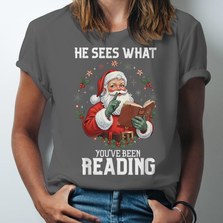 He Sees What You'Ve Been Reading Santa Book Lover Unisex Jersey T-Shirt