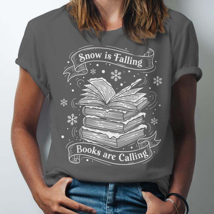 Snow Is Falling Books Are Calling Winter Reading Unisex Jersey T-Shirt Snow Is Falling Books Are Calling Winter Reading Unisex Jersey T-Shirt