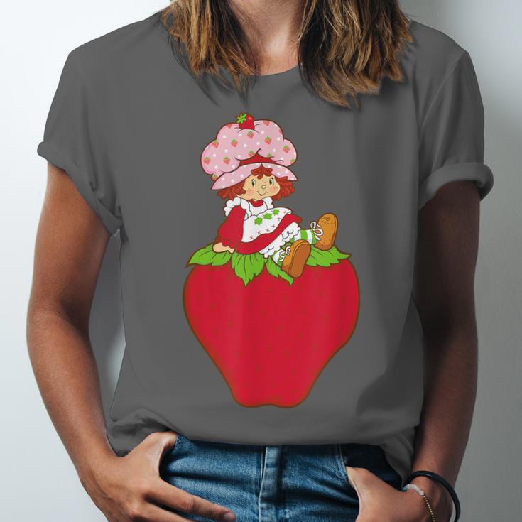 Strawberry Shortcake Sitting On Strawberry Retro Nostalgia Unisex Jersey T-Shirt Strawberry Shortcake Sitting On Strawberry Retro Nostalgia Unisex Jersey T-Shirt