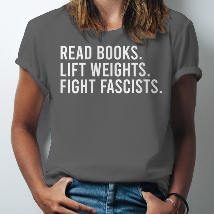 Women's Read Books Lift Weights Fight Fascists Reading Activism Unisex Jersey T-Shirt Women's Read Books Lift Weights Fight Fascists Reading Activism Unisex Jersey T-Shirt