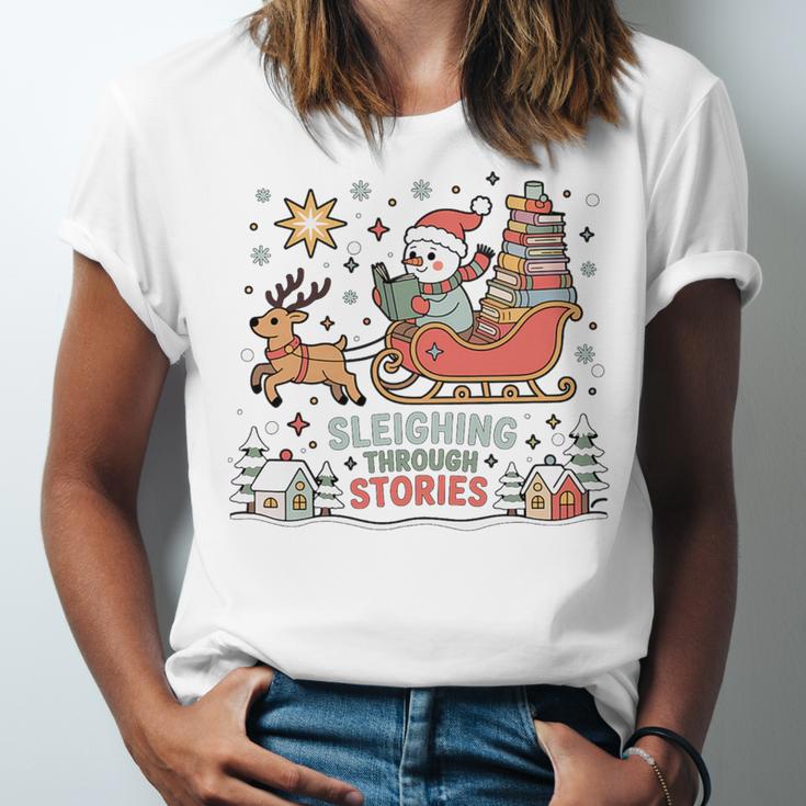 Book Lovers Winter Sleighing Through Stories Tee Premium Tri-Blend Unisex Jersey T-Shirt