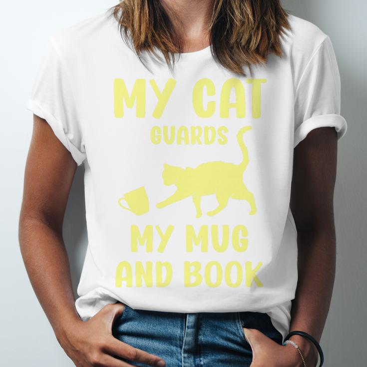 My Cat Guards My Mug And Book Humor Cats Premium Tri-Blend Unisex Jersey T-Shirt My Cat Guards My Mug And Book Humor Cats Premium Tri-Blend Unisex Jersey T-Shirt