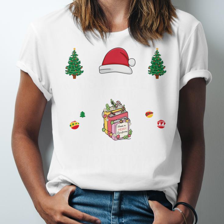 Christmas Tee Most Likely To Read A Book On Christmas Unisex Jersey T-Shirt Christmas Tee Most Likely To Read A Book On Christmas Unisex Jersey T-Shirt
