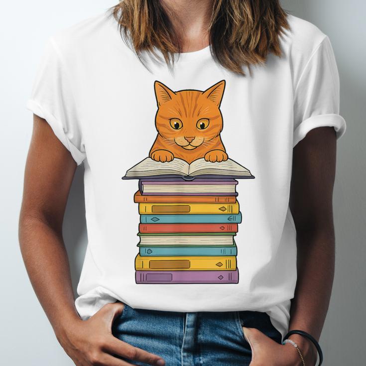 Cute Orange Tabby Cat Reading On Pile Of Books Unisex Jersey T-Shirt Cute Orange Tabby Cat Reading On Pile Of Books Unisex Jersey T-Shirt