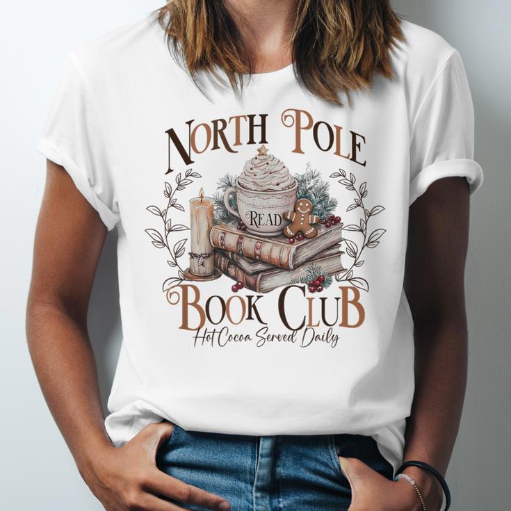 North Pole Book-Club Hot Cocoa Served Daily Christmas Book Unisex Jersey T-Shirt North Pole Book-Club Hot Cocoa Served Daily Christmas Book Unisex Jersey T-Shirt