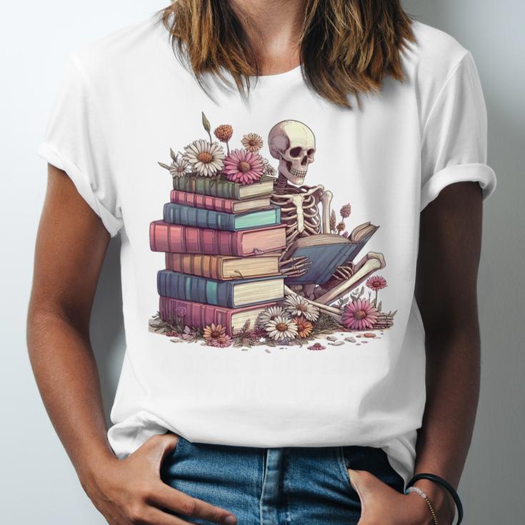 Reading A Book Per Day Keeps Reality Away Skeleton Books Unisex Jersey T-Shirt
