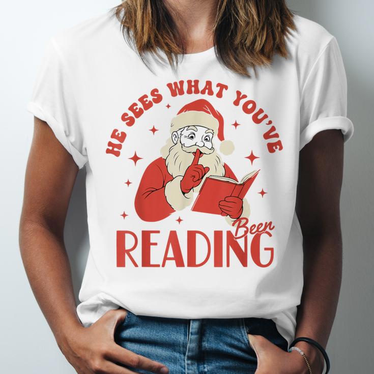 He Sees What You'Ve Been Reading Santa Book Unisex Jersey T-Shirt He Sees What You'Ve Been Reading Santa Book Unisex Jersey T-Shirt