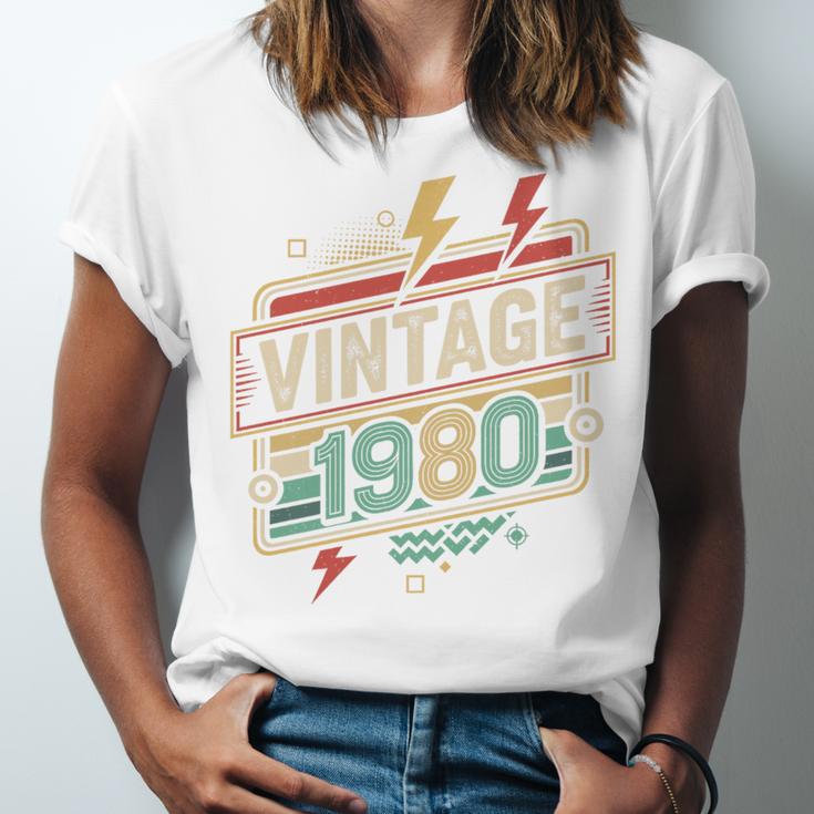 Vintage 1980 Retro Badge Decade Nostalgia Graphic Emblem Premium Tri-Blend Unisex Jersey T-Shirt