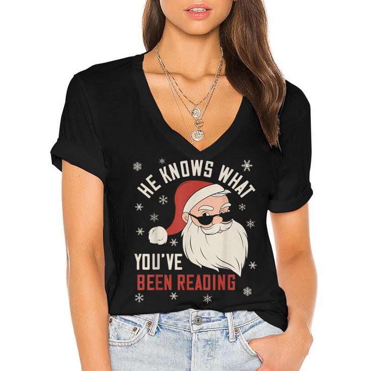 He Knows What You'Ve Been Reading Book Lover Women Santa Women's Jersey Short Sleeve Deep V-Neck Tshirt				