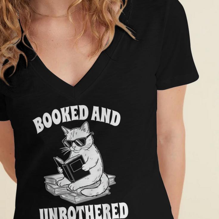 Booked And Unbothered Cat Reading Book Lovers Women's Jersey Short Sleeve Deep V-Neck Tshirt