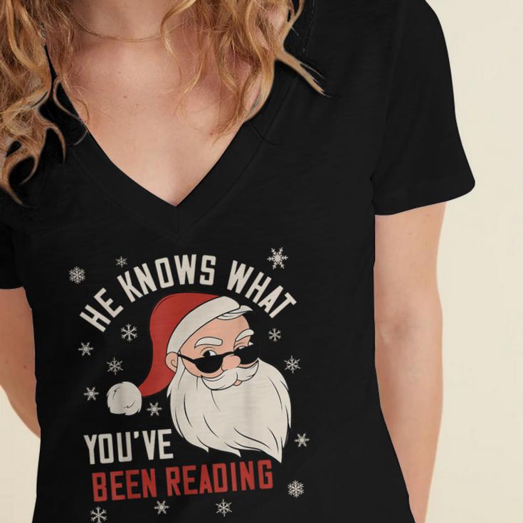 He Knows What You'Ve Been Reading Book Lover Women Santa Women's Jersey Short Sleeve Deep V-Neck Tshirt