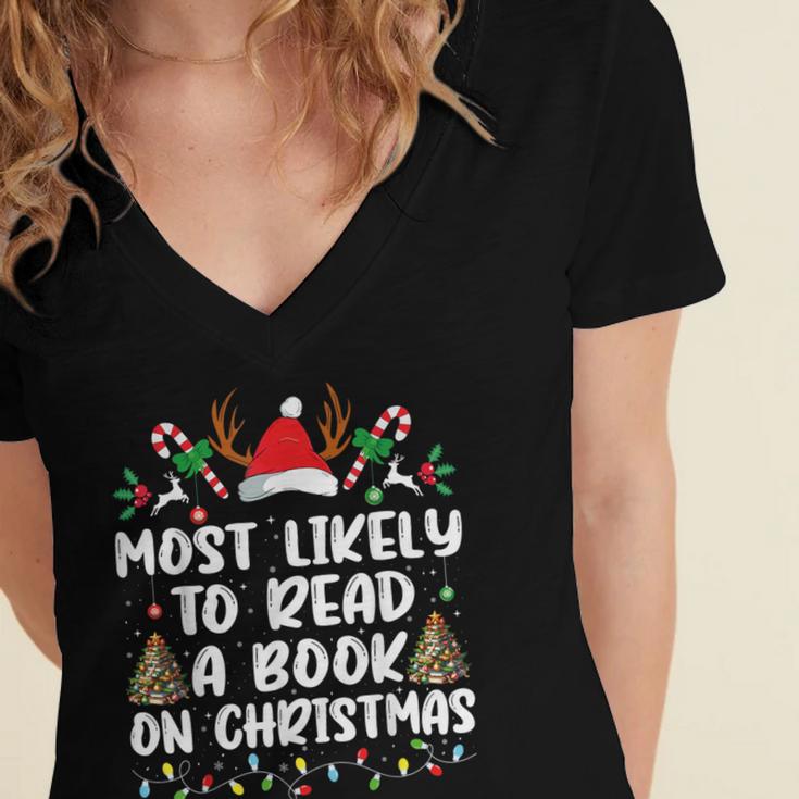 Most Likely To Read A Book On Christmas Matching Family Women's Jersey Short Sleeve Deep V-Neck Tshirt