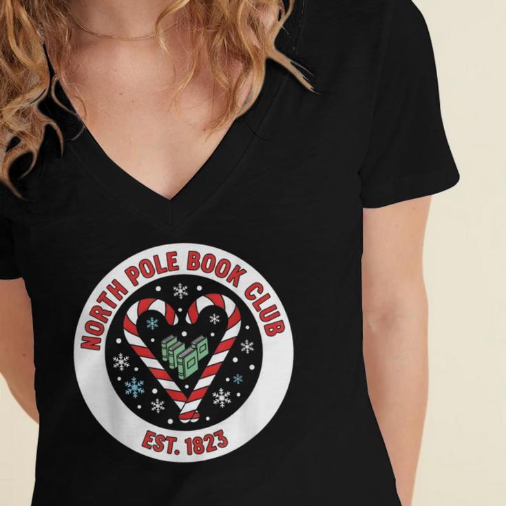 North Pole Book Club Shirt Candy Cane Christmas Women's Jersey Short Sleeve Deep V-Neck Tshirt North Pole Book Club Shirt Candy Cane Christmas Women's Jersey Short Sleeve Deep V-Neck Tshirt