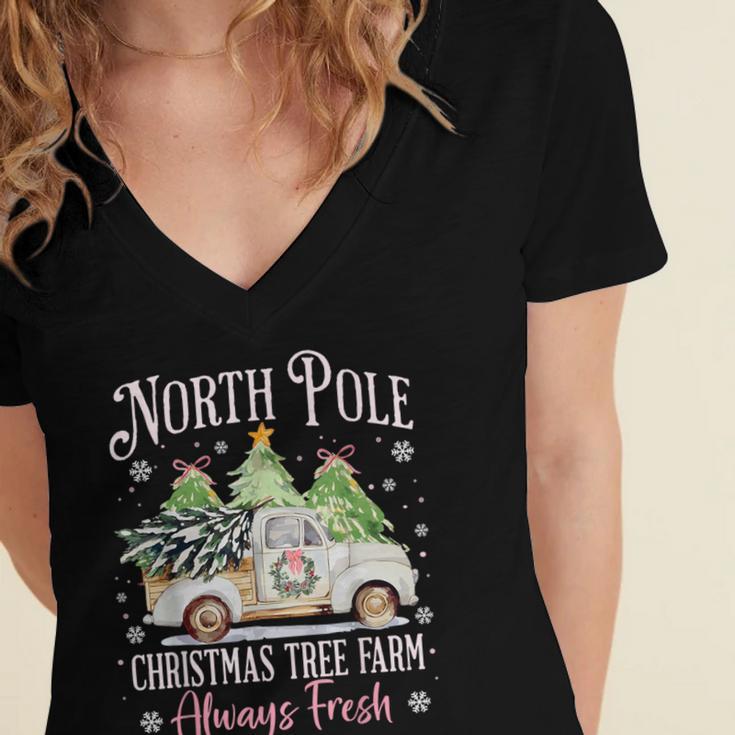 North Pole Tree Farm Merry Christmas Holiday Scene Nostalgia Women's Jersey Short Sleeve Deep V-Neck Tshirt North Pole Tree Farm Merry Christmas Holiday Scene Nostalgia Women's Jersey Short Sleeve Deep V-Neck Tshirt
