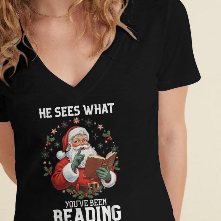 He Sees What You'Ve Been Reading Santa Book Lover Women's Jersey Short Sleeve Deep V-Neck Tshirt