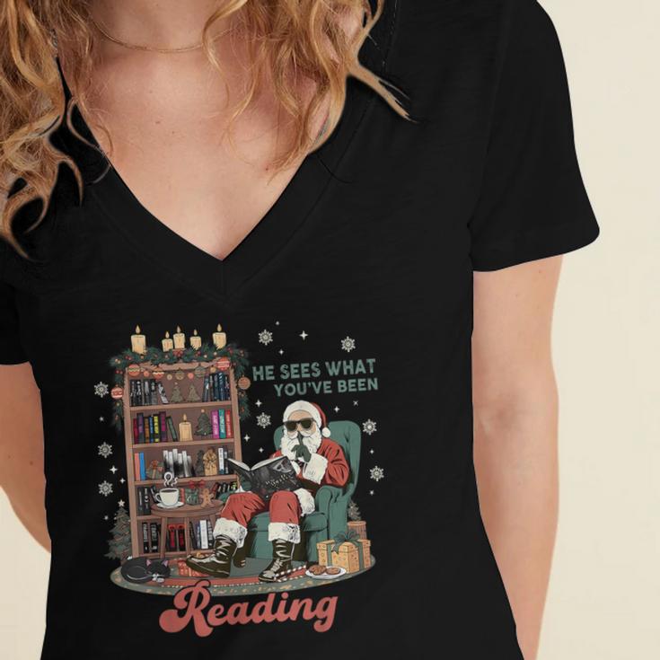 He Sees What You'Ve Been Reading Santa Christmas Bookish Women's Jersey Short Sleeve Deep V-Neck Tshirt He Sees What You'Ve Been Reading Santa Christmas Bookish Women's Jersey Short Sleeve Deep V-Neck Tshirt