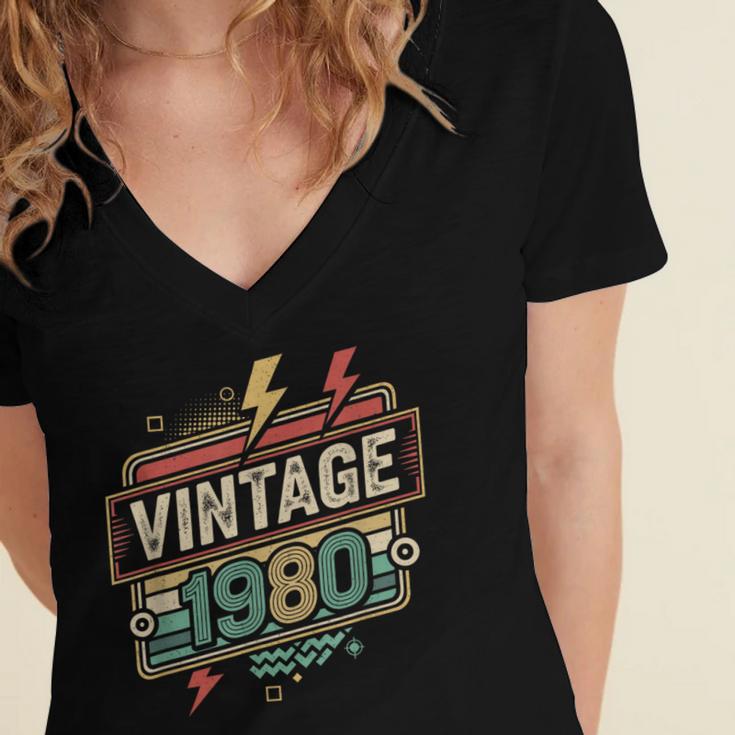 Vintage 1980 Retro Badge Decade Nostalgia Graphic Emblem Women's Jersey Short Sleeve Deep V-Neck Tshirt