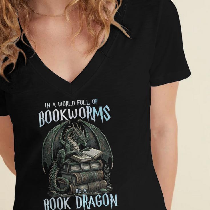 In A World Of Bookworms Be A Book Dragon Book Lover Reader Women's Jersey Short Sleeve Deep V-Neck Tshirt