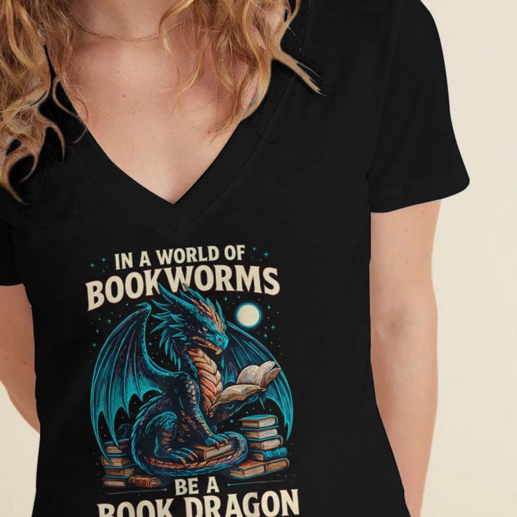 In a World Of Bookworms Be a Book Dragon Reading Women's Jersey Short Sleeve Deep V-Neck Tshirt