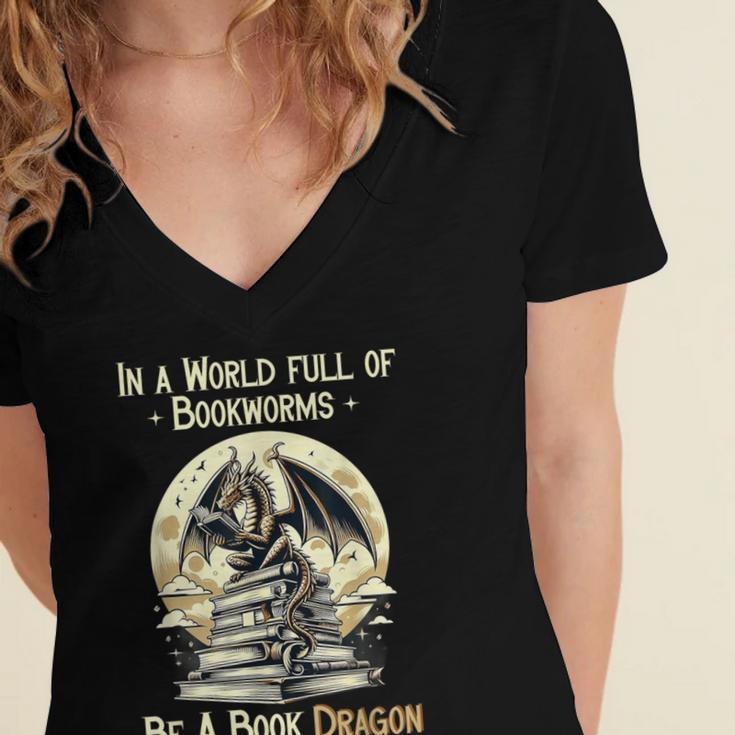In a World Full Of Bookworms Be a Book Dragon Books Reading Women's Jersey Short Sleeve Deep V-Neck Tshirt