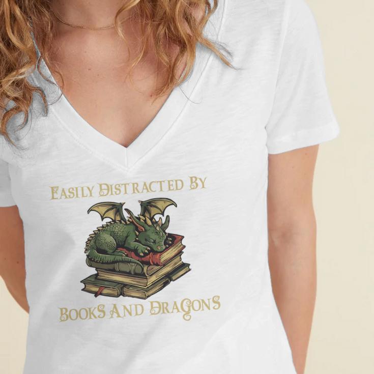 Easily Distracted By Books And Dragons Graphic Premium Women's Jersey Short Sleeve Deep V-Neck Tshirt Easily Distracted By Books And Dragons Graphic Premium Women's Jersey Short Sleeve Deep V-Neck Tshirt