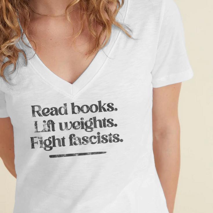 Read Books Lift Weights Fight Fascists Vintage Women's Jersey Short Sleeve Deep V-Neck Tshirt Read Books Lift Weights Fight Fascists Vintage Women's Jersey Short Sleeve Deep V-Neck Tshirt