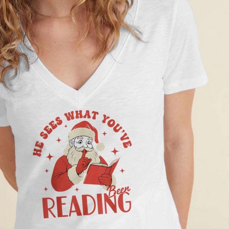 He Sees What You'Ve Been Reading Santa Book Women's Jersey Short Sleeve Deep V-Neck Tshirt
