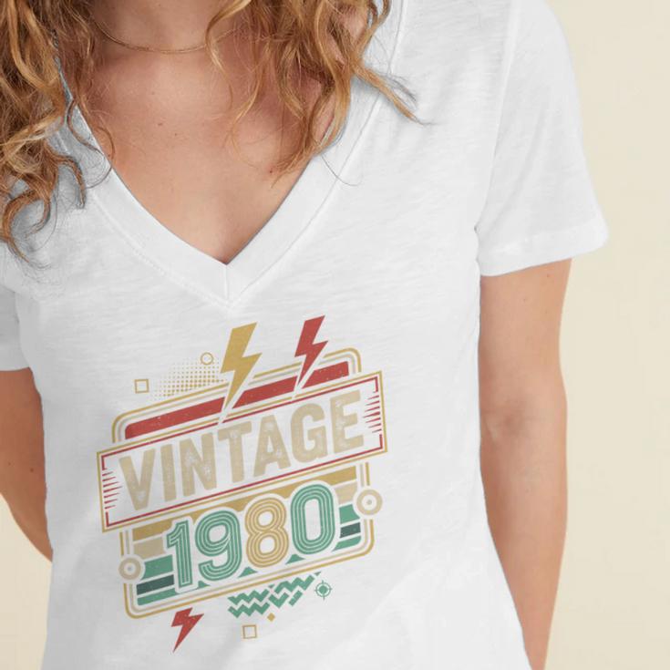Vintage 1980 Retro Badge Decade Nostalgia Graphic Emblem Premium Tri-Blend Women's Jersey Short Sleeve Deep V-Neck Tshirt Vintage 1980 Retro Badge Decade Nostalgia Graphic Emblem Premium Tri-Blend Women's Jersey Short Sleeve Deep V-Neck Tshirt