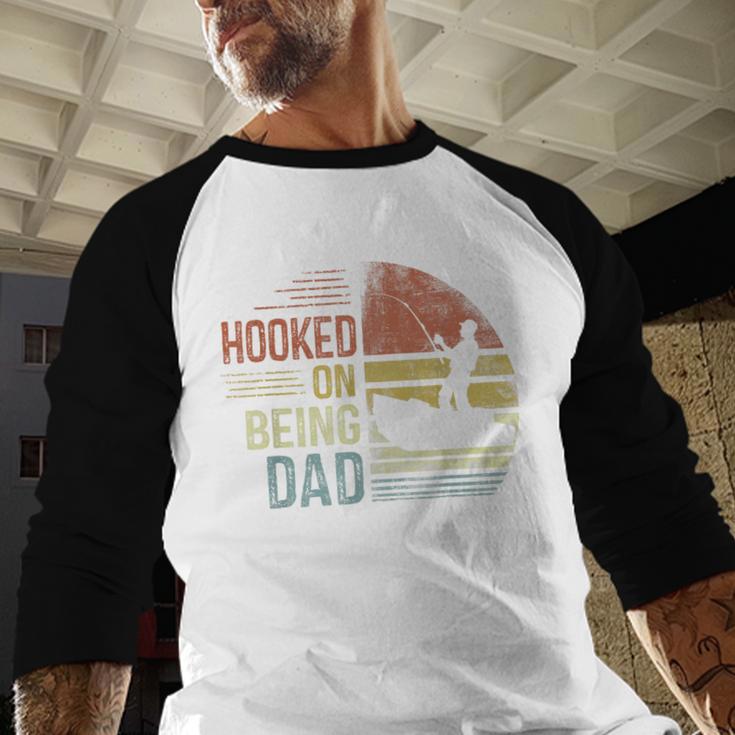 Hooked On Being Dad Fishing Dad Father's Day Men Baseball Raglan Shirt Hooked On Being Dad Fishing Dad Father's Day Men Baseball Raglan Shirt