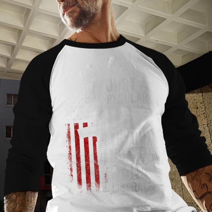 Just A Regular Dad Trying Not To Raise Liberals Father's Day Men Baseball Raglan Shirt