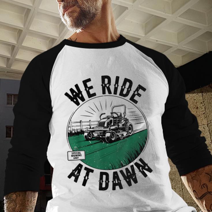 We Ride At Dawn Lawn Mower Zero-Turn Dad Mowing Men Baseball Raglan Shirt