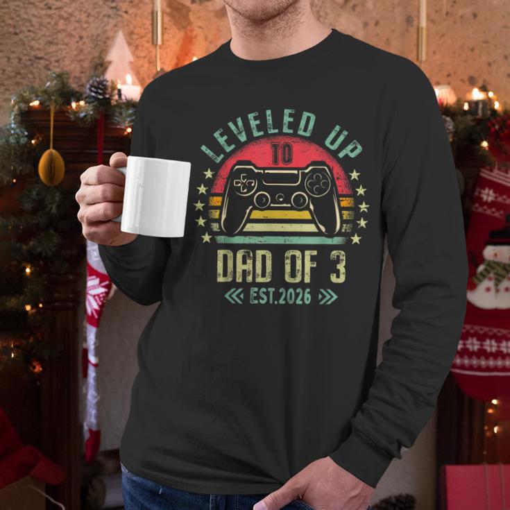 I Leveled Up To Dad Of 3 2026 Promoted To Dad Of Three Kids Men Long Sleeve T-Shirt
