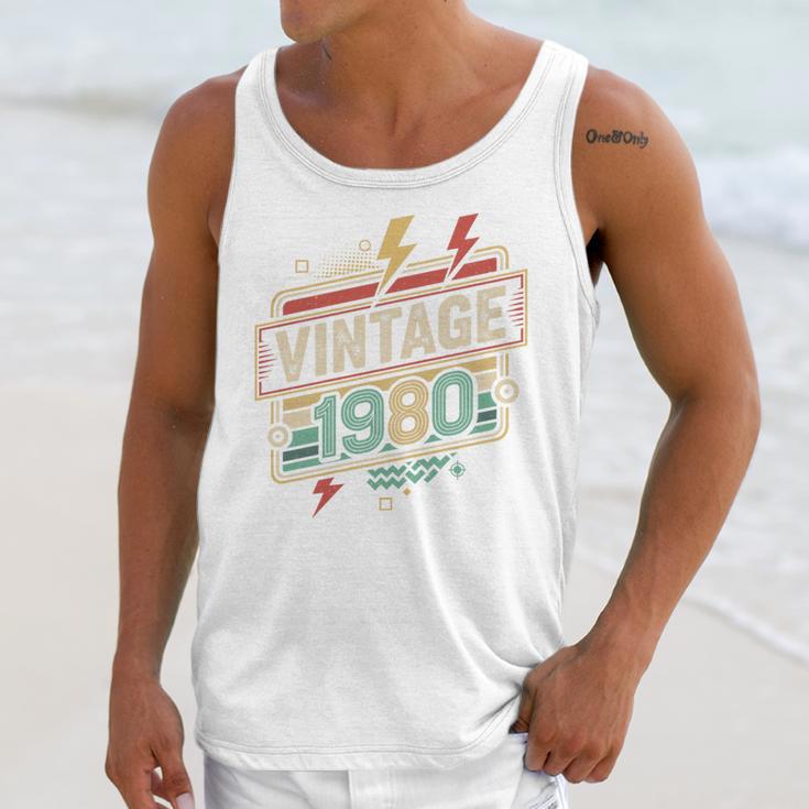 Vintage 1980 Retro Badge Decade Nostalgia Graphic Emblem Premium Tri-Blend Unisex Tank Top Vintage 1980 Retro Badge Decade Nostalgia Graphic Emblem Premium Tri-Blend Unisex Tank Top