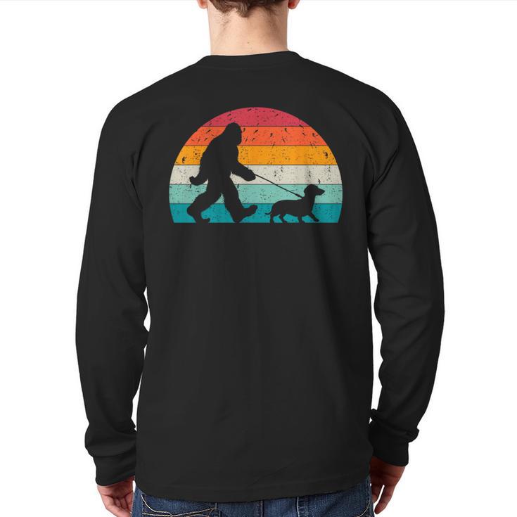 Retro Sasquatch Lover Doxie Wiener Dog Walker Bigfoot Walking a Dog Dachshund Weiner Dog Dad Weenie Small Long Sleeve T-Shirt Back Print