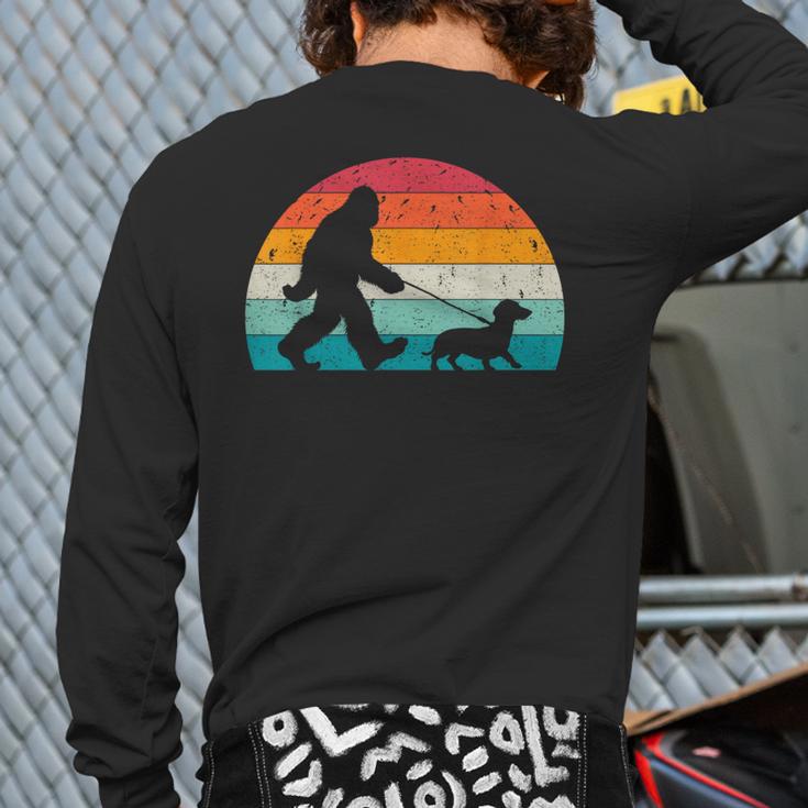 Retro Sasquatch Lover Doxie Wiener Dog Walker Bigfoot Walking a Dog Dachshund Weiner Dog Dad Weenie Small Long Sleeve T-Shirt Back Print