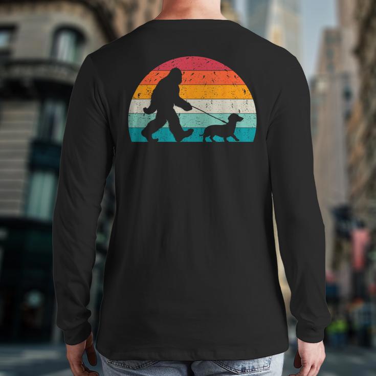 Retro Sasquatch Lover Doxie Wiener Dog Walker Bigfoot Walking a Dog Dachshund Weiner Dog Dad Weenie Small Long Sleeve T-Shirt Back Print