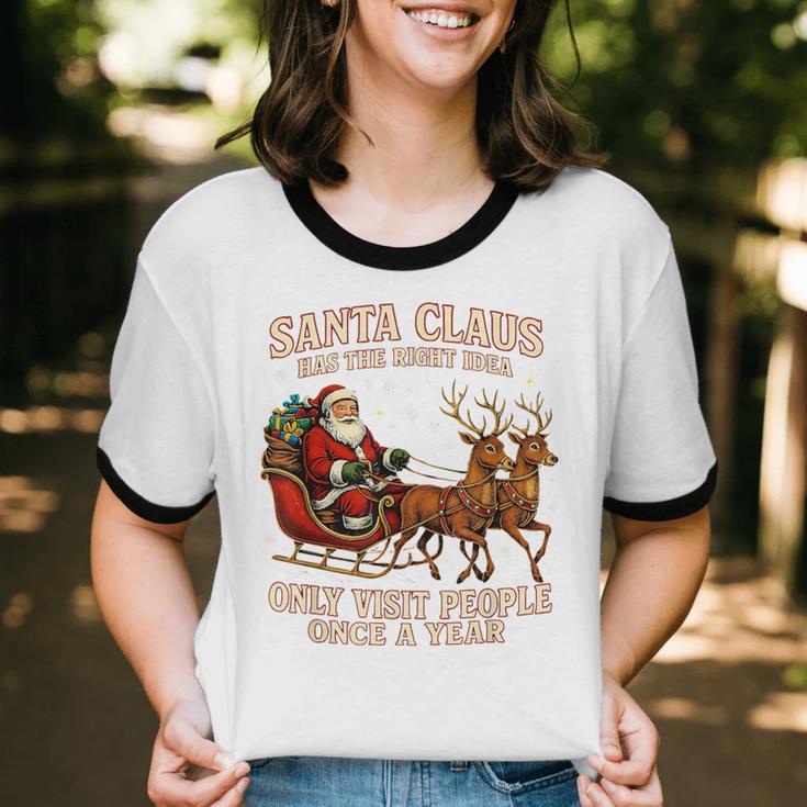 Santa Has The Right Idea Introvert Christmas Unisex Cotton Ringer T-Shirt Santa Has The Right Idea Introvert Christmas Unisex Cotton Ringer T-Shirt