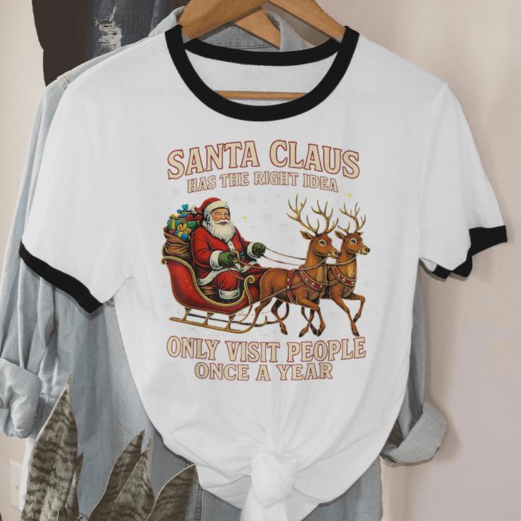 Santa Has The Right Idea Introvert Christmas Unisex Cotton Ringer T-Shirt Santa Has The Right Idea Introvert Christmas Unisex Cotton Ringer T-Shirt
