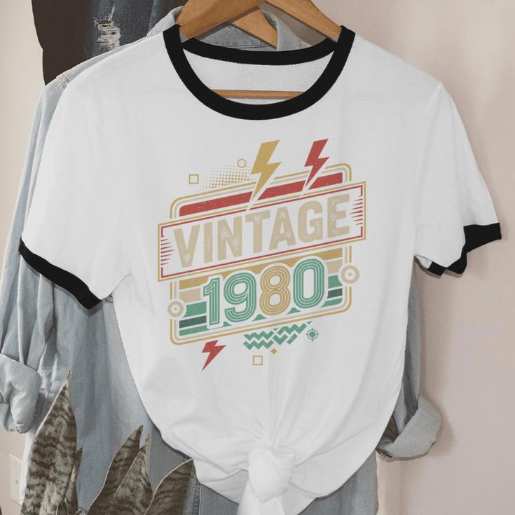 Vintage 1980 Retro Badge Decade Nostalgia Graphic Emblem Premium Tri-Blend Unisex Cotton Ringer T-Shirt Vintage 1980 Retro Badge Decade Nostalgia Graphic Emblem Premium Tri-Blend Unisex Cotton Ringer T-Shirt