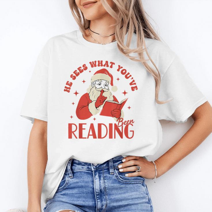 He Sees What You'Ve Been Reading Santa Book Unisex T-Shirt He Sees What You'Ve Been Reading Santa Book Unisex T-Shirt