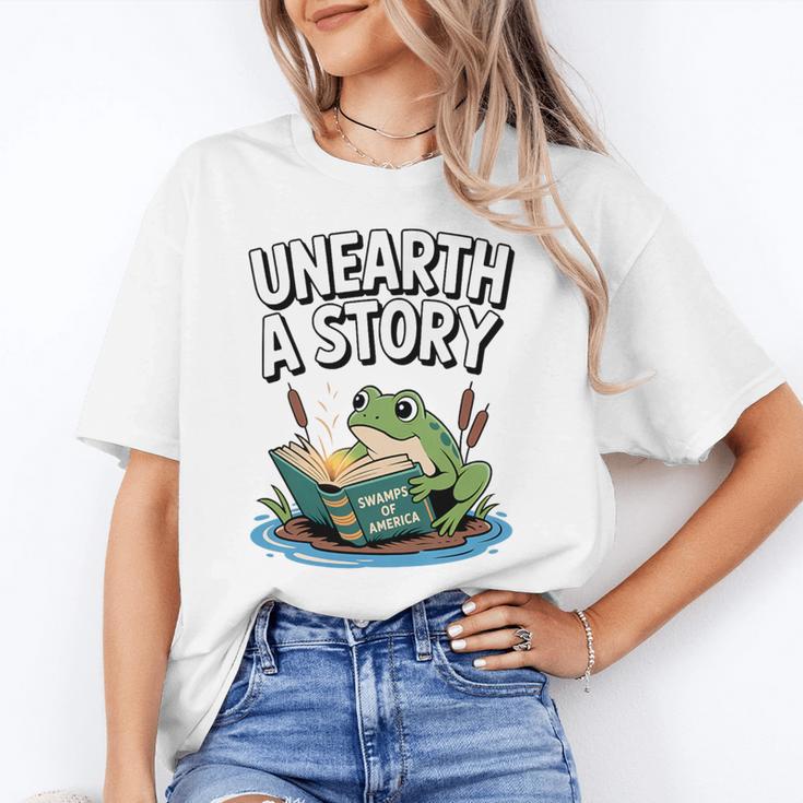 Unearth a Story Frog Reading a Book Summer 2026 Premium Tri-Blend Unisex T-Shirt
