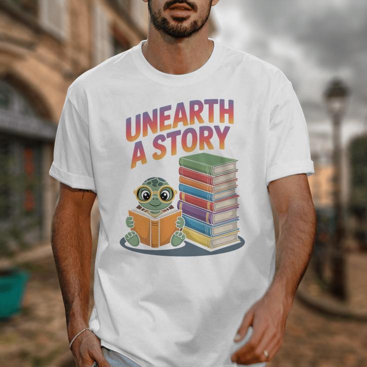 Unearth A Story Cute Turtle Reading Books Librarian Unisex T-Shirt