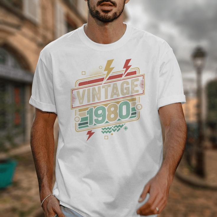Vintage 1980 Retro Badge Decade Nostalgia Graphic Emblem Premium Tri-Blend Unisex T-Shirt