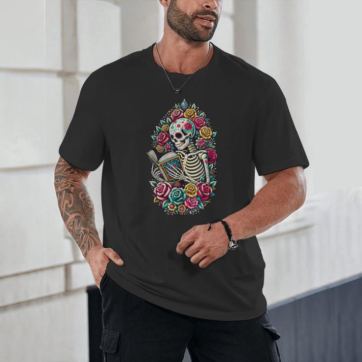 Book Lover Skeleton Reading With Dia De Los Muertos Flowers Unisex T-Shirt Book Lover Skeleton Reading With Dia De Los Muertos Flowers Unisex T-Shirt